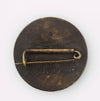 Antique Japanese Meiji period shakudo disk brooch.