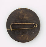 Antique Japanese Meiji period shakudo disk brooch.