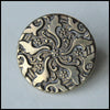 Antique stamped ornamental button 7/8 inch.