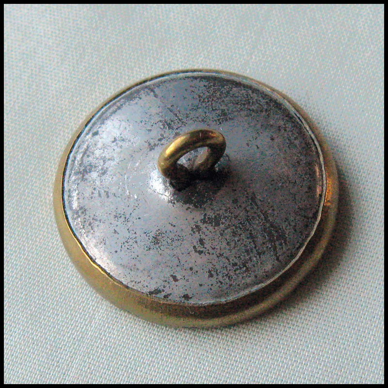 Antique stamped ornamental button 7/8 inch.
