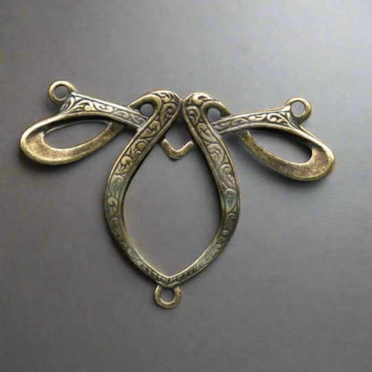 Art Nouveau design, high quality stamped solid oxidized brass connector. 22 x 30mm. Sold individually. b9-0844
