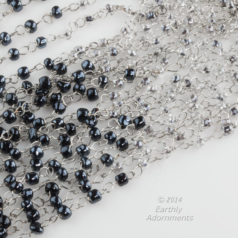 Czech bead chain of silver wire and 3mm black and clear glass 16+" length. Sold indiv.