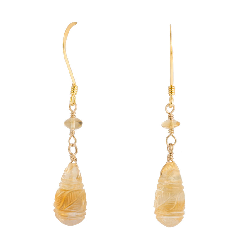 Earrings of vintage natural carved Citrine teardrops beads.