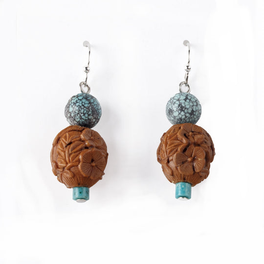 Chinese carved fruit pit earrings with spiderweb turquoise beads. j-erbd165