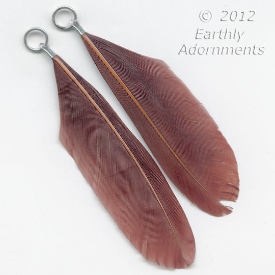 Vintage sienna brown feather pendant with silver crimp and jump. Sold in a pair. b10-0352