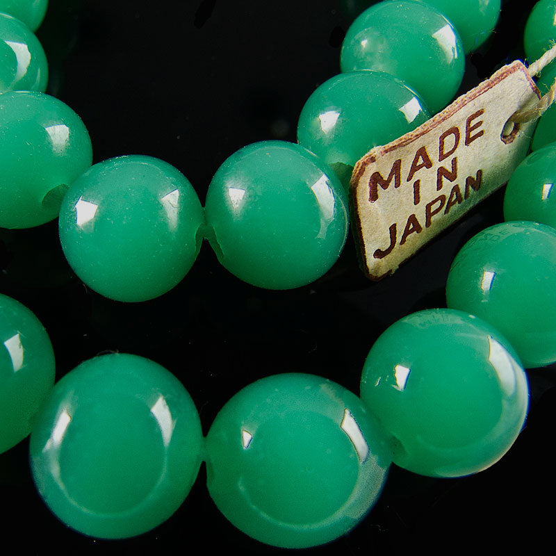 Vintage dark teal green translucent rounds, 7x8mm, Japan, pkg of 10. 