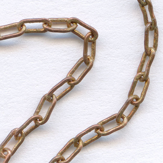 Vintage red brass fine cable chain. 3x1mm. Sold by the foot. b12-chn534b(e)