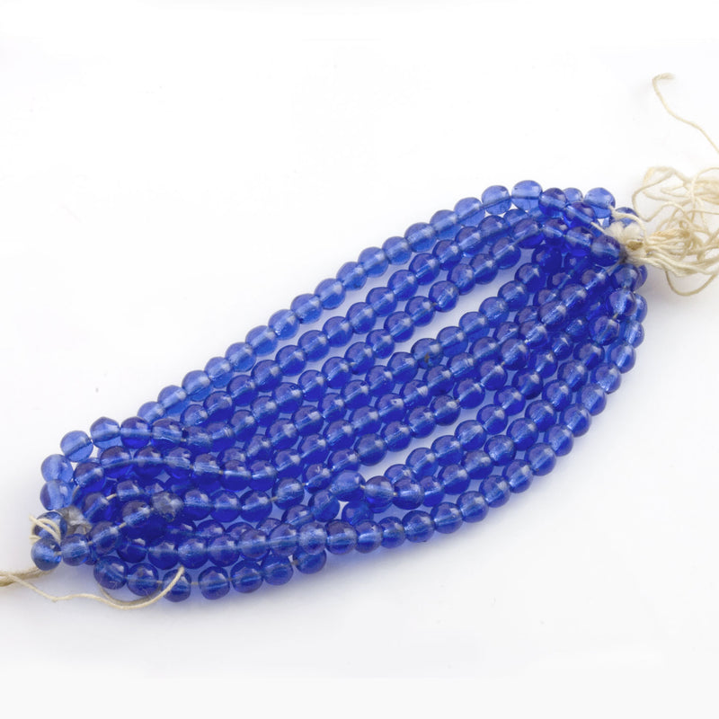 Vintage 4mm smooth sapphire blue rounds Czechoslovakia strand of 50.