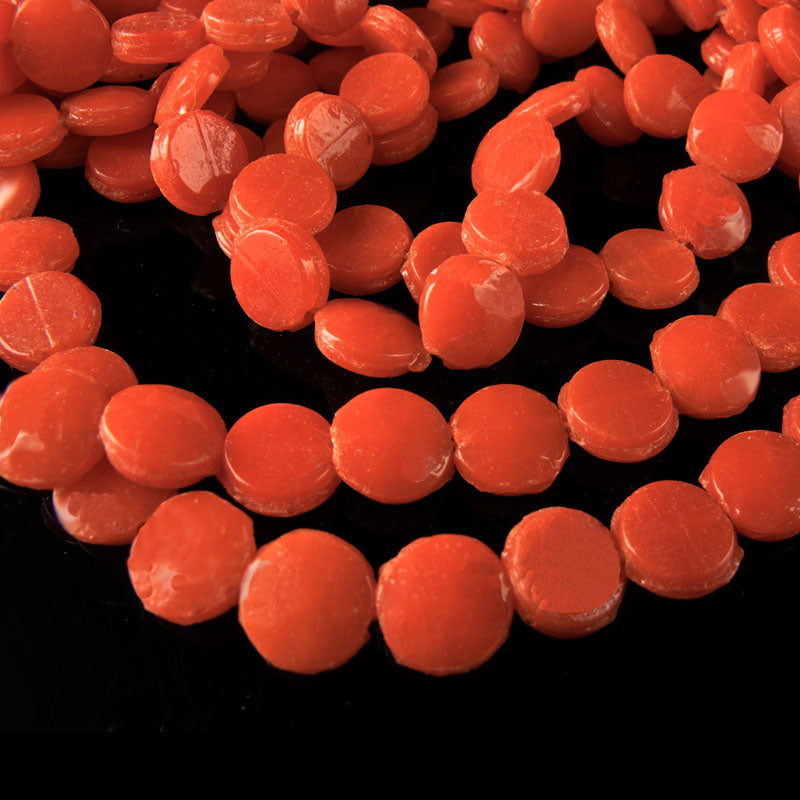 Vintage Bohemian faceted bright coral domed nailheads, 7mm strand of 24. Sold indiv,