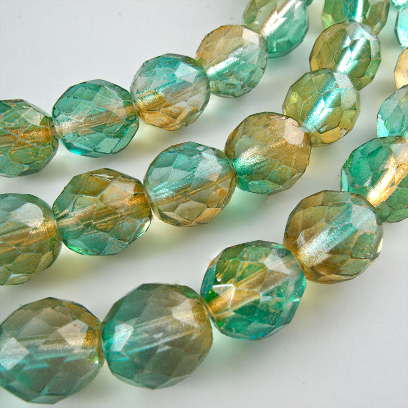 Firepolished 10mm faceted rounds, 2-tone in amber and aqua. Contemporary Czech. Package of 10. b11-mi-0163(e)