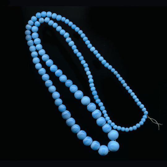 Vintage blue graduated 30 inch bead strand from India. b11-bl-1180