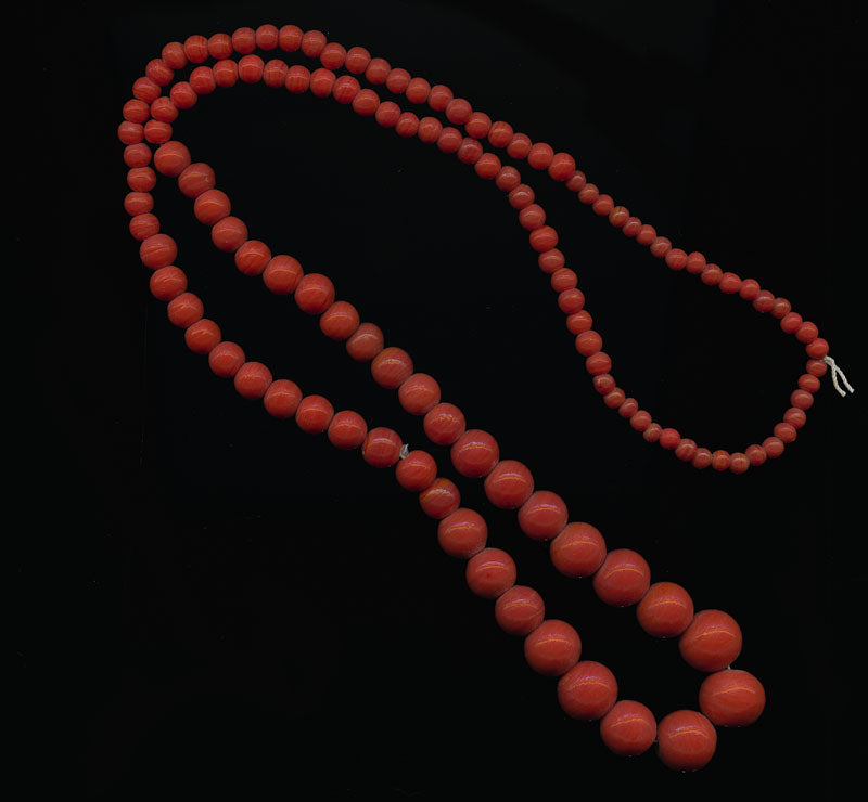 Vintage red graduated 30 inch bead strand from India.