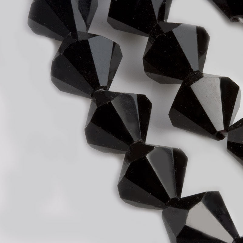 Vintage tin cut crisp jet glass bicones, Czechoslovakia. 11x10mm 6 pcs.