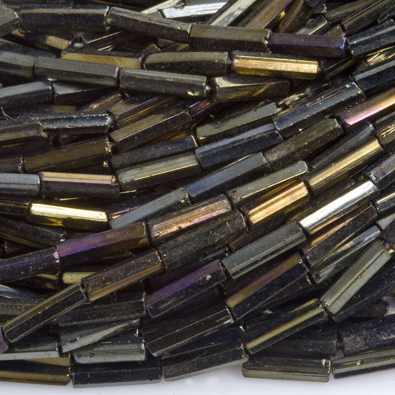 Vintage brown iris bugle beads Austria. 7x2mm. 1 hank (10.4 grams).
