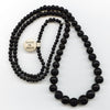 Vintage Black Hand-Wound Glass Beads. India. 5-14mm.  Graduated 30 inch Strand.