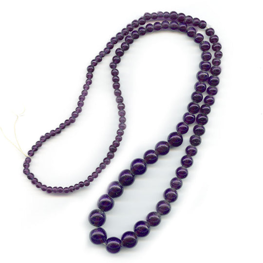 Vintage amethyst glass graduated 30 inch bead strand India. b11-pp-1059