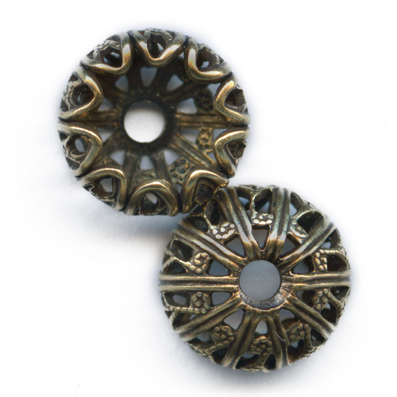 Oxidixed brass filigree bead cap 10x6mm with an 8mm opening. Pkg. of 2.