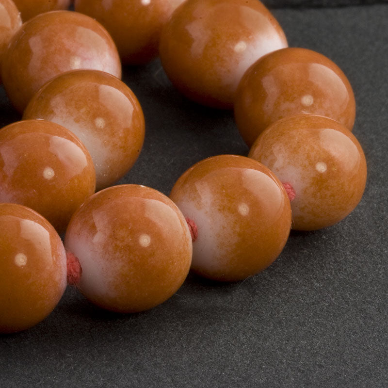 Vintage Japanese white and coral rounds average 10mm, Pkg of 10.