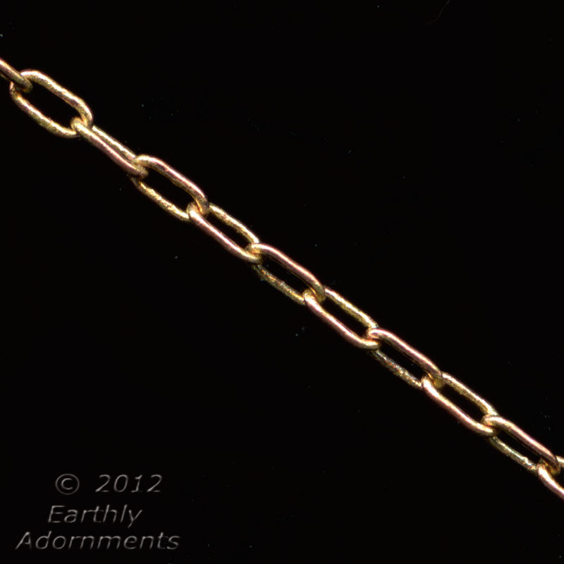 Vintage solid brass fine cable chain the color of rose gold. 3x1mm. Sold by the foot.