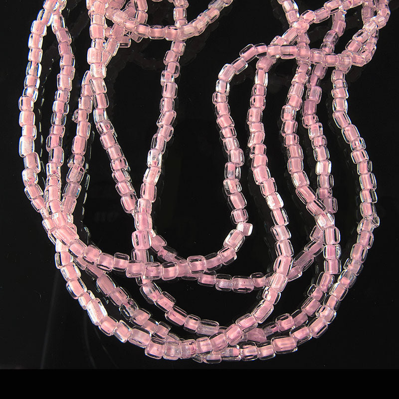 Antique Italian hex cut colored core crystal seed beads, size 10, 18-gram hank.