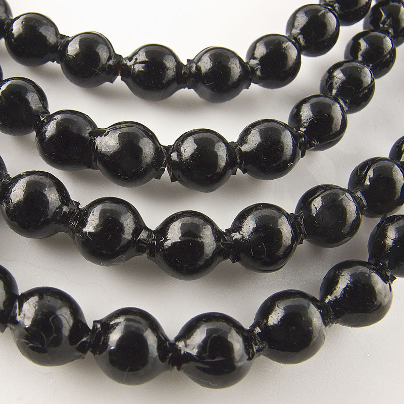 Vintage hollow blown jet glass rounds 6mm, Japan strand of 50. 