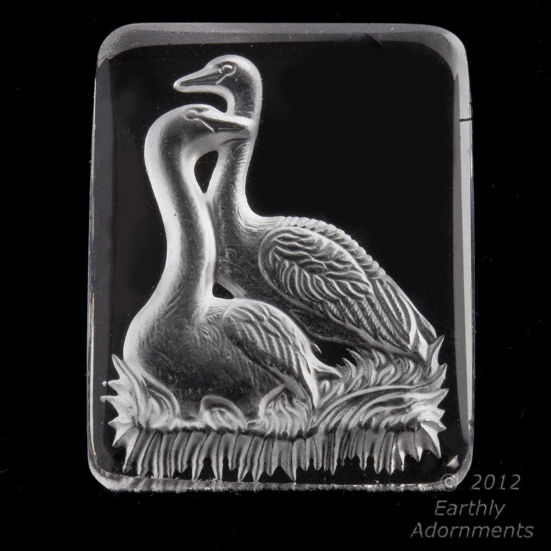 Vintage clear glass intaglio of two swans, carved on reverse and frosted. West Germany 34x25 mm. 1 piece. 