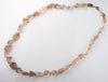 Vintage necklace of graduated and knotted red rutilated quartz large freeform beads