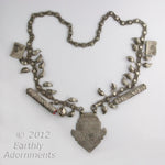 Antique large Islamic Central Asian tribal silver amulet and talisman chain necklace.