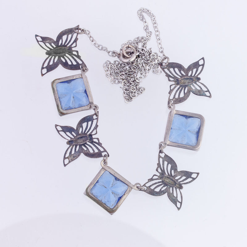 Art Deco beveled blue glass and silver butterfly  panel necklace. 