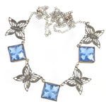 Art Deco beveled blue glass and silver butterfly  panel necklace. 