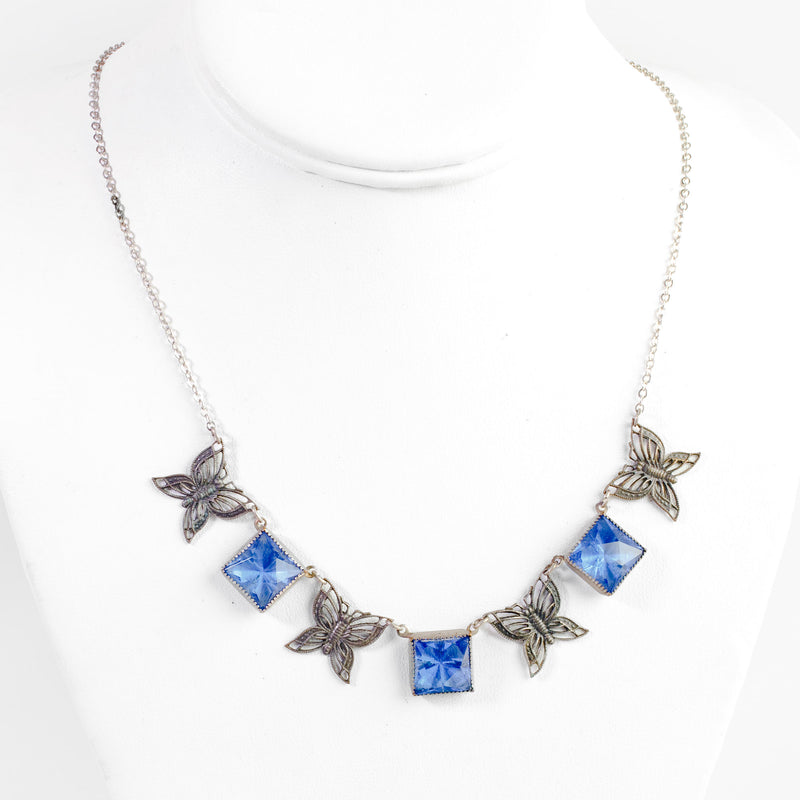 Art Deco beveled blue glass and silver butterfly  panel necklace. 