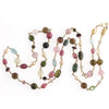 Tourmaline, garnet, topaz, pearl and 14k gold necklace.  32 inches