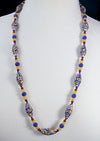 Vintage Venetian matte millefiori oval glass bead necklace. 1970s. 28 inches