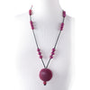 Necklace of rare antique Chinese Peking glass beads in an opaque plum color