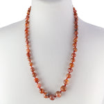 Necklace of hand cut graduated natural carnelian agate beads, India 1960s