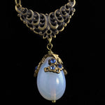 Edwardian style sautoir necklace of vintage opal glass and brass bar chain.