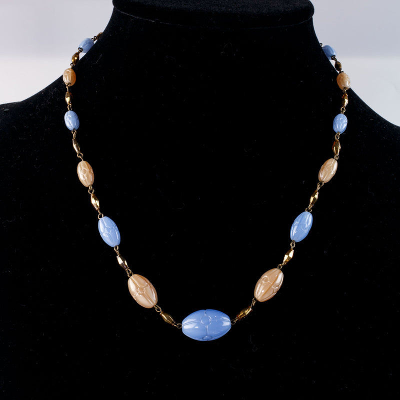 Vintage Czech pressed glass bead necklace in blue and pale yellow graduated ovals beads. 1920s-30s