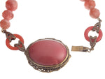 1920s Art Deco rose pink glass and brass lavalier necklace. Czechoslovakia.