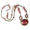 1920s Art Deco rose pink glass and brass lavalier necklace. Czechoslovakia.