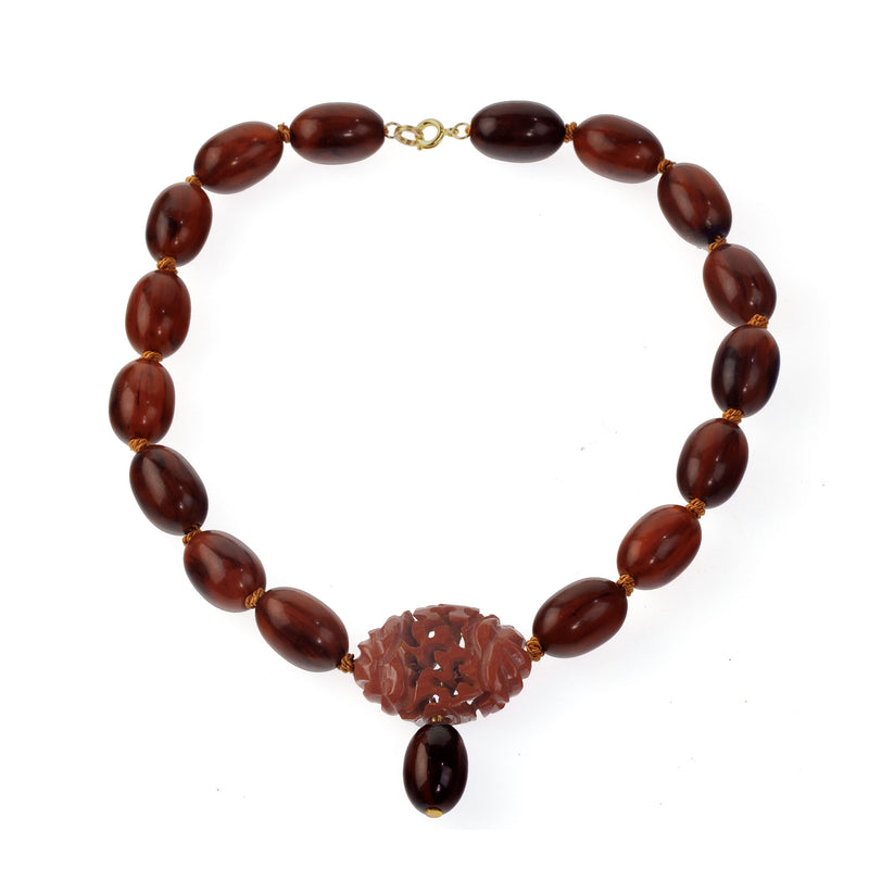 Vintage Bakelite Amber oval bead necklace with carved Bakelite focal bead