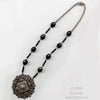 Antique turn of the century Bohemian silver metal and jet glass necklace.