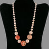 Necklace of vintage graduated fine blush Angelskin coral beads. Sterling clasp. 19in
