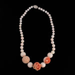 Necklace of vintage graduated fine blush Angelskin coral beads. Sterling clasp. 19in