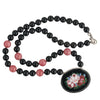 Antique Victorian Pietra Dura stone set in sterling silver bezel and strung with vintage black onyx and Rhodochrosite beads.