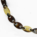 -Vintage carved openwork tortoise shell pendant on a tortoise shell link chain