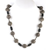 Vintage necklace with silver metal filigree beads and matte black glass beads.  23 inches