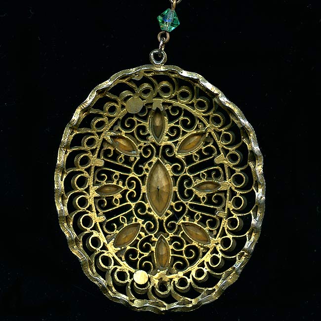 Edwardian brass filigree pendant with multi colored glass stones.