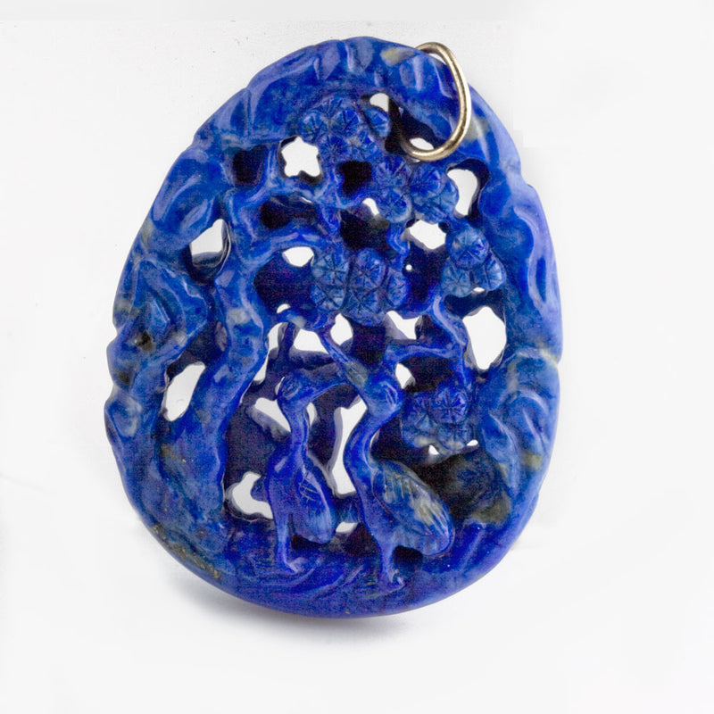 Natural lapis deep carved and pierced pendant. Storks and fawn. Unusual intense color