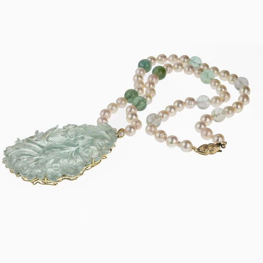 Aquamarine carved pendant with Japanese Akoya semi-baroque pearls and tourmaline beads. 18", 14kt. pdgm116