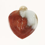 Carved red jadeite tiger heart pendant 
